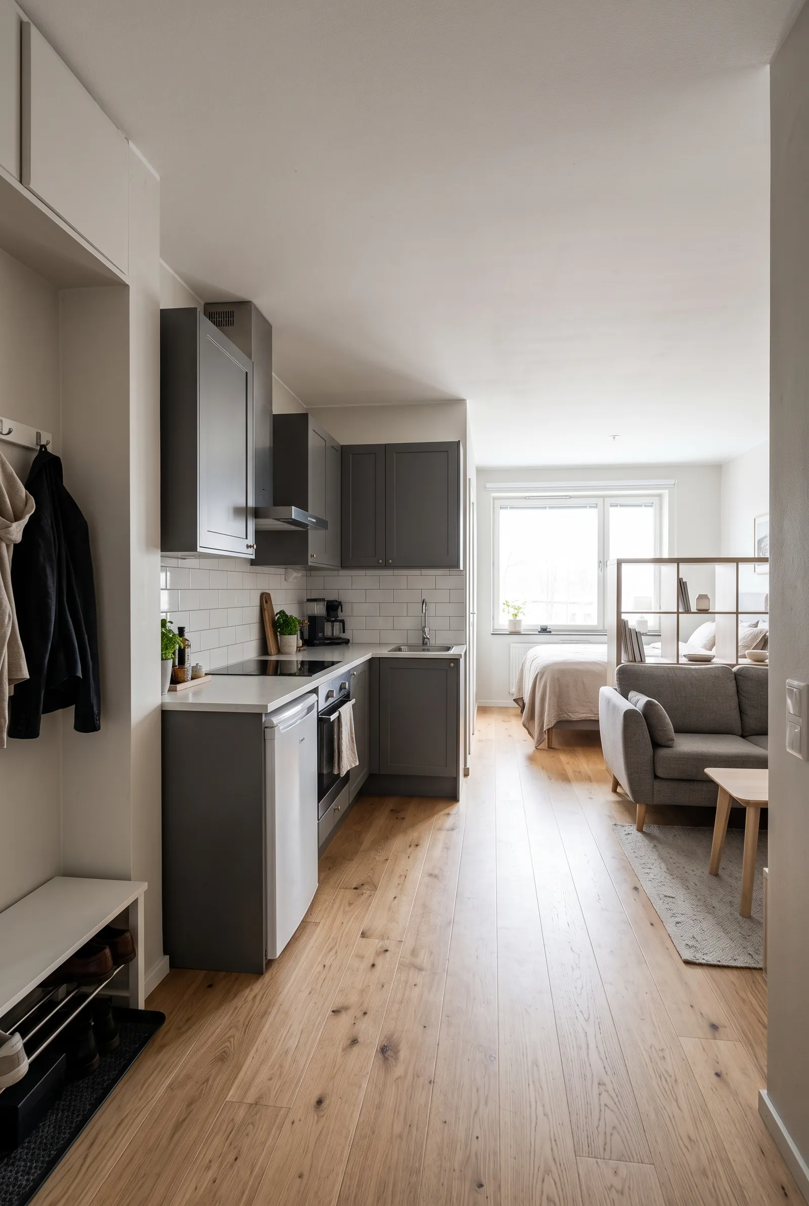 e1-12-studio-apartment-kitchen-ideas-grey-shaker-cabinets-along-entryway-walkway